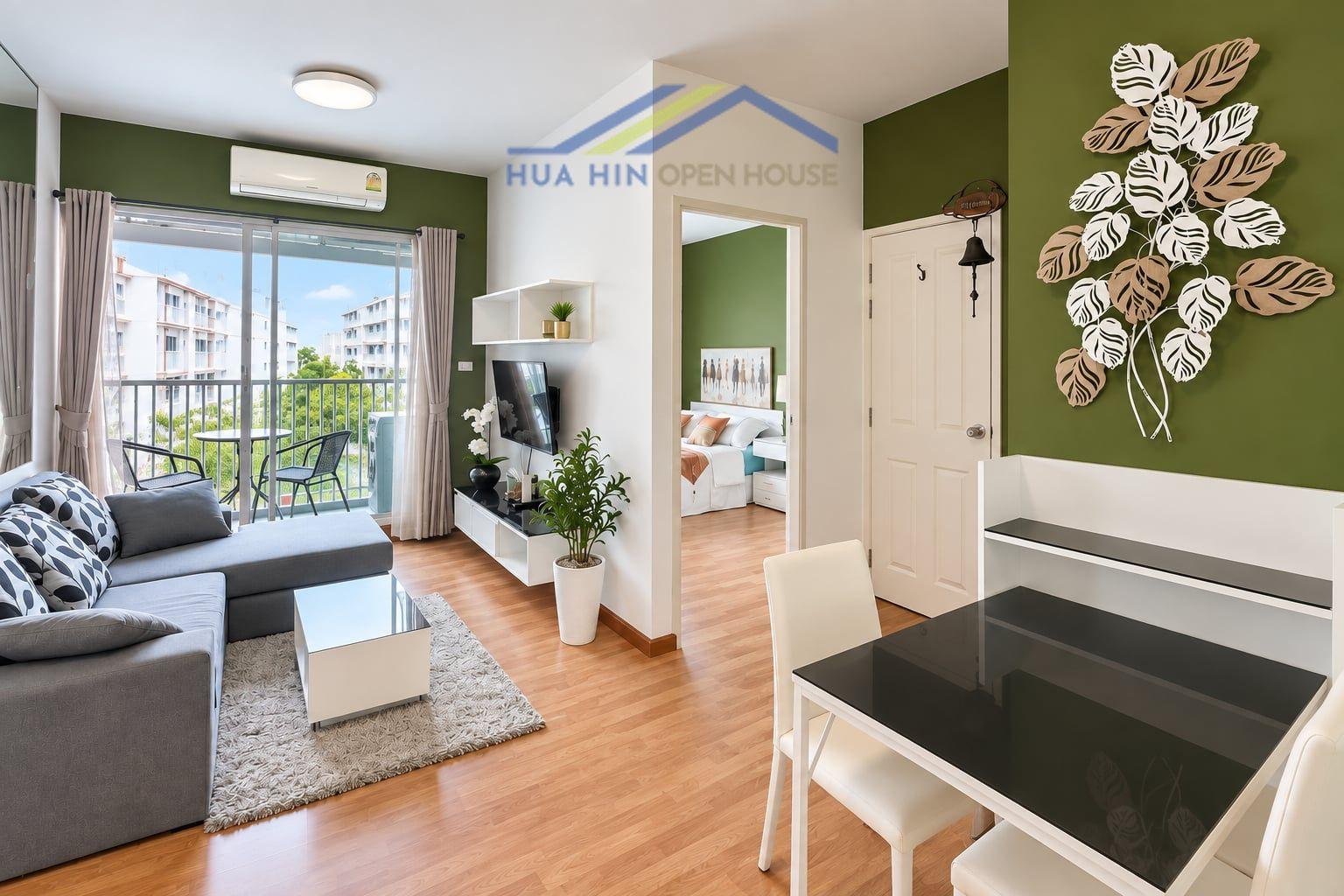 Bright and modern condo interior with pool view, featuring a cozy living area, dining space, and stylish decor.