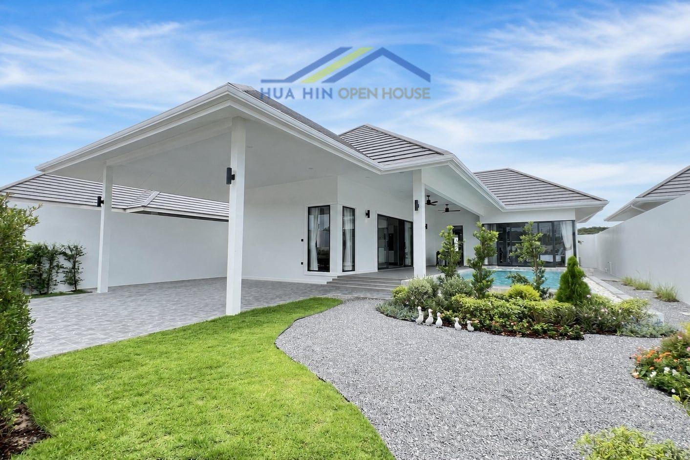 Geen Village 3-bedroom villa with landscaped garden and pool area in Hua Hin, featuring a spacious outdoor living space.