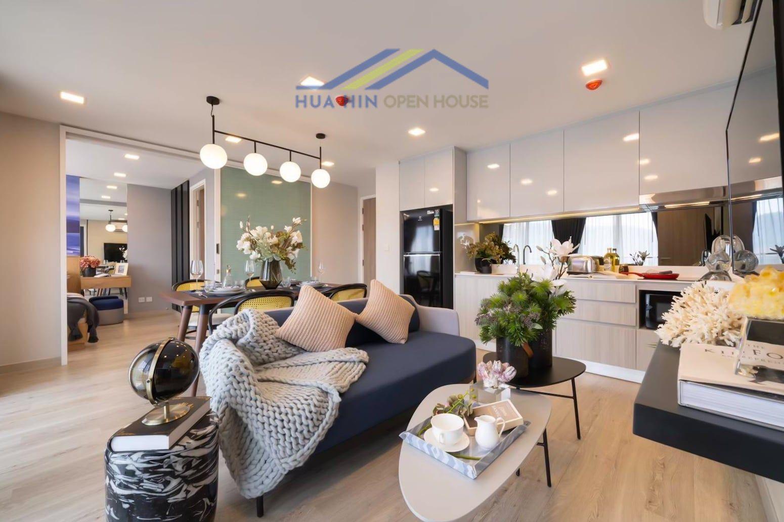 Modern corner unit condo interior featuring a cozy living area, dining space, and stylish kitchen in Hua Hin.
