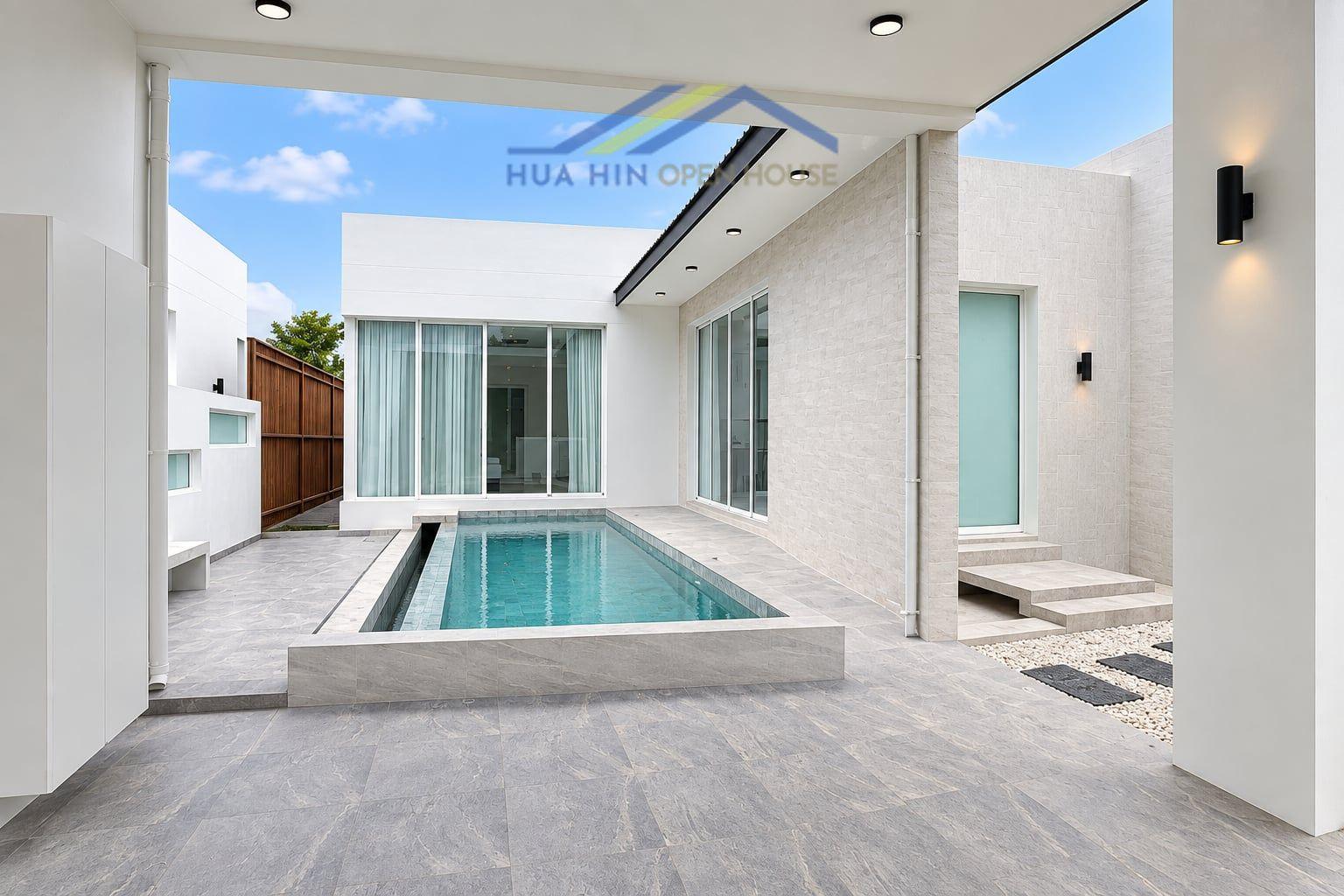 Modern 3-bedroom villa featuring a private pool, spacious patio, and large windows in Hua Hin Soi 70.