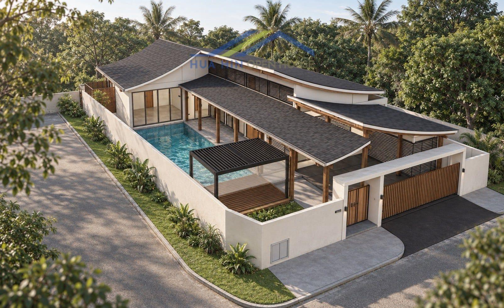 Luxury private pool villa with modern design, lush landscaping, and outdoor relaxation area in Pak Nam Pran, Thailand.