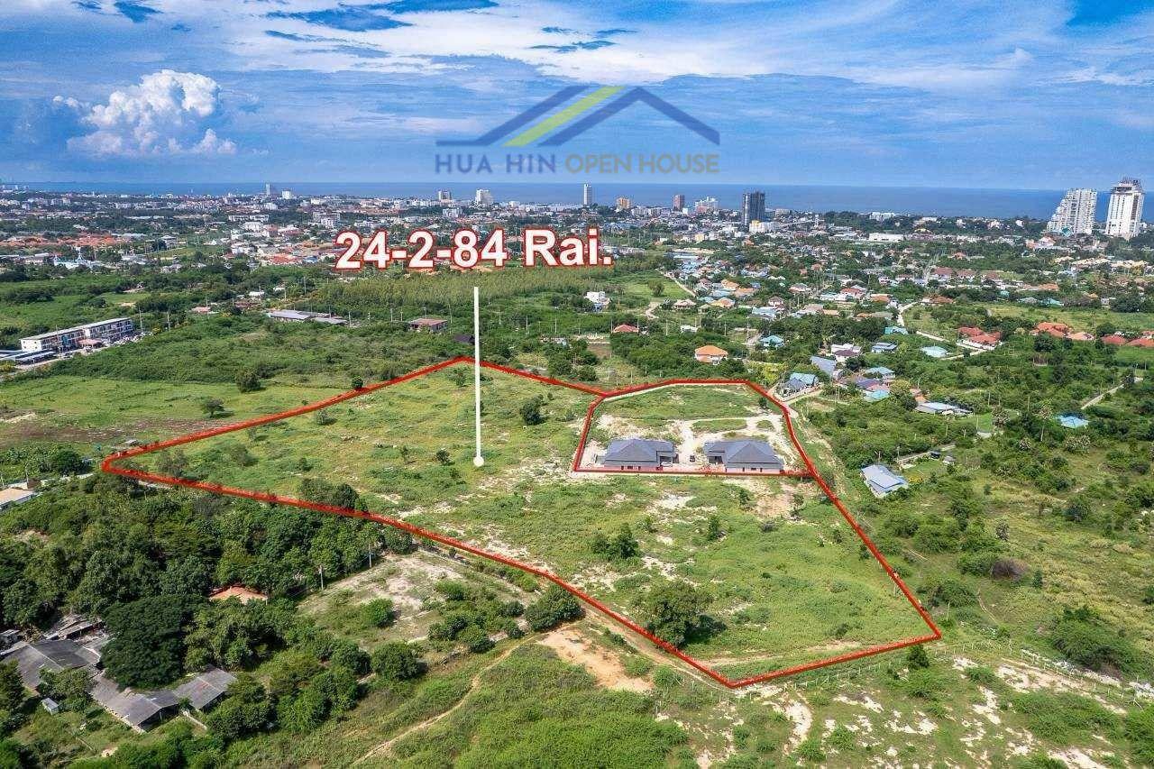 Spacious development Hua Hin land for sale in Hua Na, Hua Hin, featuring 24-2-84 Rai with scenic views and nearby amenities.