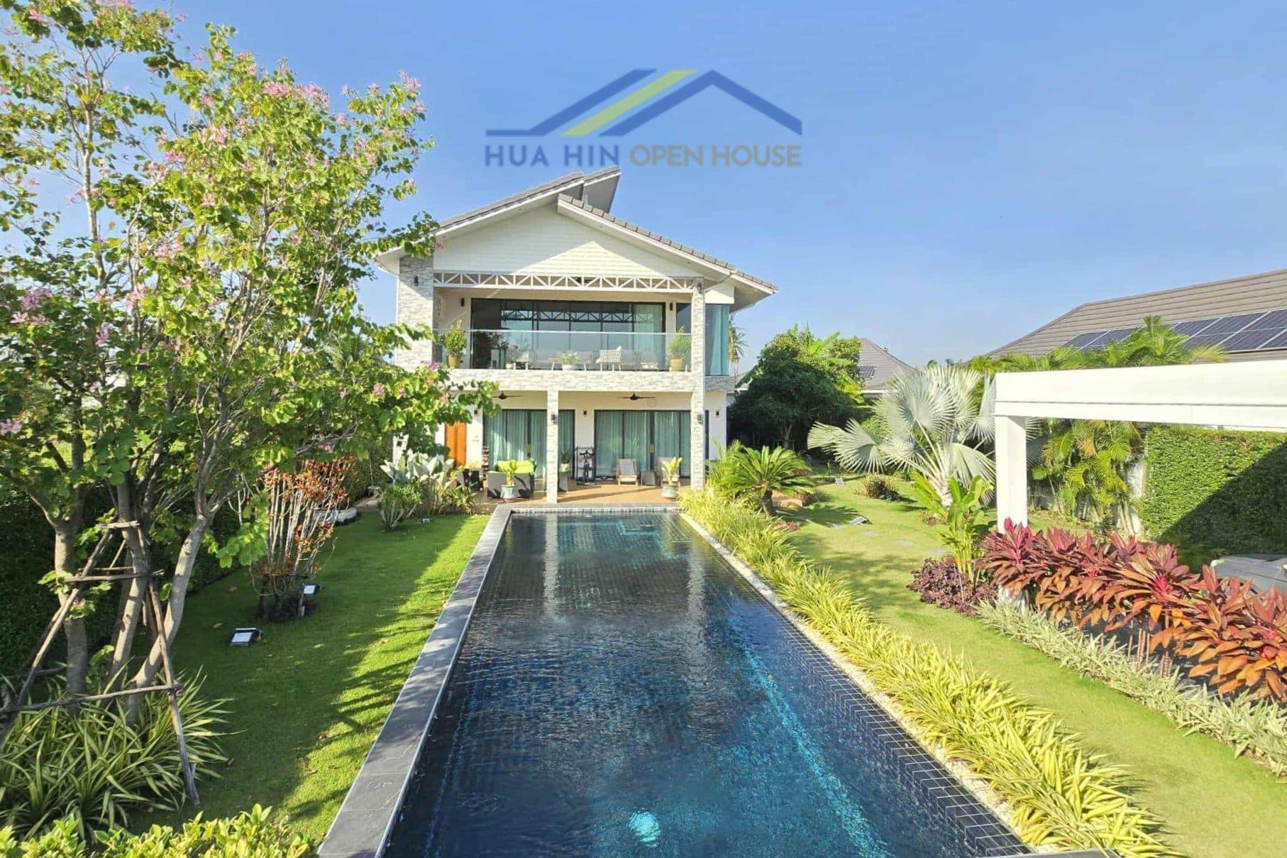 Elegant 2-storey pool villa with lush gardens, four bedrooms, and a stunning swimming pool in Hua Hin Soi 112.